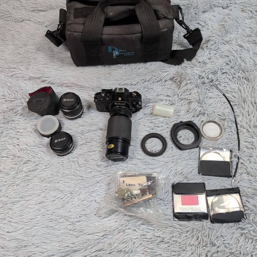 Vintage Nikon EM 35mm Film Camera Multi  Lenses TriStar Filters Case Not Tested